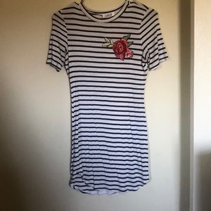 Striped dress with a rose